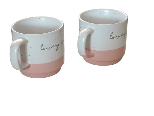2 Pink and White Mugs