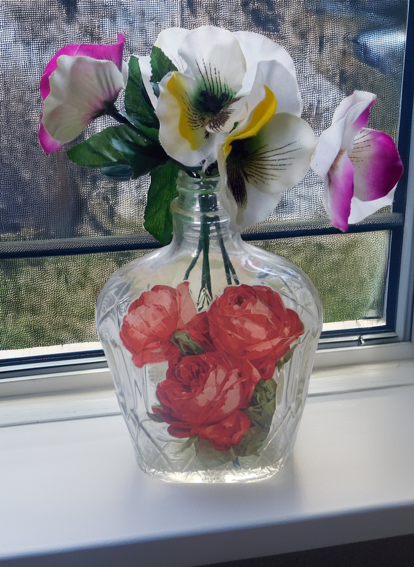 Vase en verre en forme de bouteille